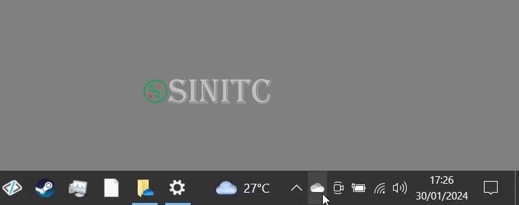 Bấm vào biểu tượng khay hệ thống OneDrive