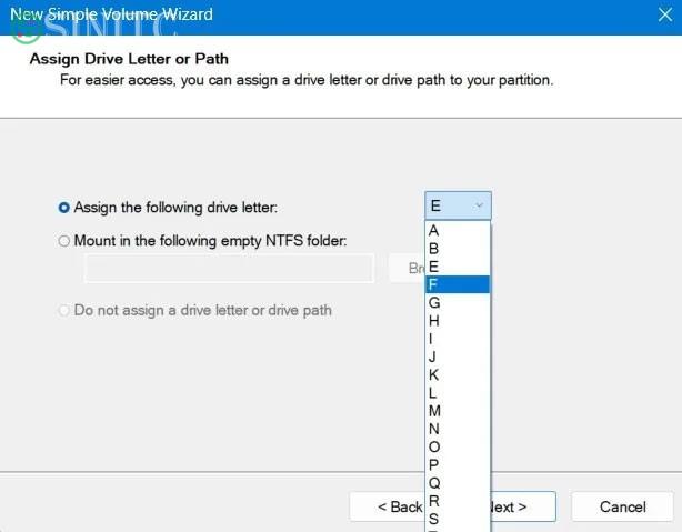 Gán một ký tự cho ổ USB trong Disk Management.