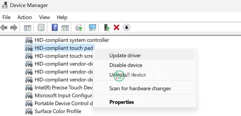 Cập nhật driver HID-Compliant Touchpad trong Task Manager Windows.